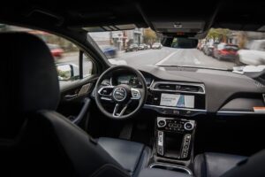 The interior of a Waymo Jaguar I-Pace robotaxi as it drives through San Francisco without a driver.