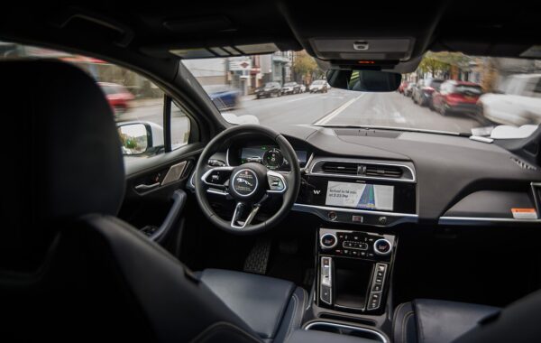 The interior of a Waymo Jaguar I-Pace robotaxi as it drives through San Francisco without a driver.